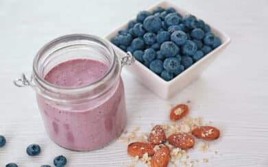 Jar with fresh blueberry smoothie